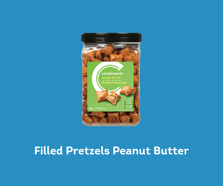 filled peanut butter pretzels in a clear tub