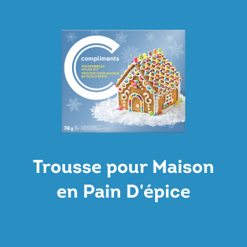 Une boîte bleue contenant le kit Maison en pain d'épices Compliments